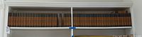 Full shelf view showing all Harvard Classics five-foot shelf volumes present except volumes 20 and 22 are missing.