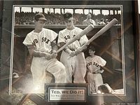 Full view of framed black and white photo featuring Ted Williams and Johnny Pesky in Red Sox uniforms with crossed bats, and young batboy in background