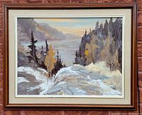 Full frontal view of framed oil painting against brick background