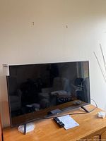 Front view of LG 43-inch TV on table