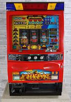 Front view of the Japanese Tecmo slot machine showing the colorful graphics, buttons, and coin slot.