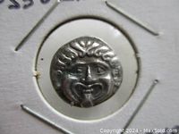 Close-up of obverse showing gorgoneion detail