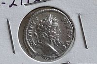 Obverse side showing the bust of Emperor Septimius Severus with visible inscriptions.