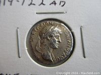 Close-up of obverse showing Emperor Hadrian's bust with inscriptions around the edge.