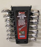 Front view of 7 stubby combo wrenches in plastic holder showing GRIP branding and wrench sizes.
