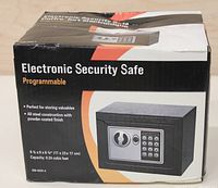 Box front showing 'Electronic Security Safe Programmable' labeling with product image and dimensions.