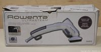 Box of Rowenta Ultra Steam handheld fabric steamer showing product branding and model GS2910