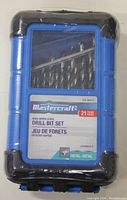 Front view of the closed blue and black plastic case with visible drill bits inside and Mastercraft branding and product info.