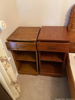 Both bedside tables side by side showing overall form, drawer handle details, and top surface condition.