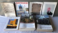 A group photo of eight magazines including Architectural Record, Architectural Technology, AIA Journal, and Abitare arranged on a table, showing front covers and spines.