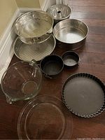Photo showing all pans and glassware as a set to identify variety and quantity