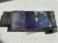Photo of entire lot showing six printer blocks including photographic portraits, an organ illustration, and smaller text/logo blocks.