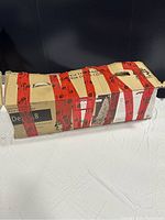 Box for a 6.5 ft Pre-Lit Flocked Frisco Pine Tree with detailed specifications to verify item identity.