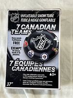 Front of the box showing the NHL inflatable snow tube featuring 7 Canadian teams with tube diameter 37 inches and safety features.