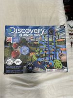 Front of box showing branding and product image of assembled marble run with 321 pieces.