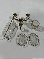 Photo showing the full lot of 5 vintage glass pieces on a white background.