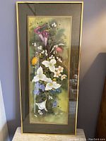 Full-height frontal view of framed watercolor artwork