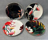 Four 8-inch diameter dessert plates with colorful floral Mid-Century Modern designs by Perennial Meditation displayed together.