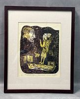 Full view of framed surrealist etching print showing two abstract figures and signature details.