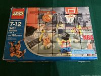 Front of the original Lego box showing brand, set number 3431, age recommendation, piece count, and streetball basketball scene with four Lego minifigures in action.
