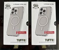 Front view of packaged iPhone 15 Pro Max and iPhone 15 Pro TUFF 8 cases, MagSafe compatible, showing clear TPU design and military drop test certification.