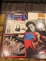 First photo showing six LP albums including Cyndi Lauper, Tears for Fears, Platinum Blonde, and Billy Idol.