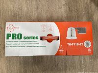 Closed box of Nexlite Pro Series pot lights showing packaging and model info TH-P11B-22