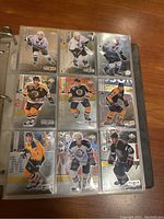 First binder page showing nine Upper Deck Black Diamond player cards