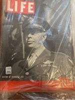 Cover of Life magazine March 21, 1944 showing a man in military uniform with medals.