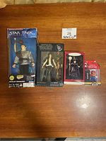 Lot of five pop culture action figures: Star Trek Romulan Commander, Star Wars Han Solo, Hallmark Madame Leota, Nintendo/Dekko Mario figures.