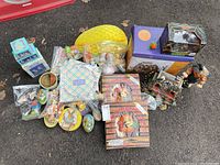 Full lot overview with both Easter and Halloween items placed together showing the various figurines, boxes, and strings of lights.