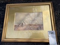 Overall front view showing framed watercolor with MaxSold sticker