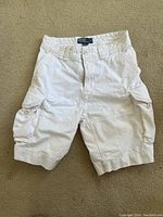 White Polo Ralph Lauren cotton cargo shorts, size 30 visible on tag