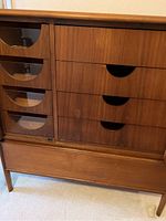 Front view showing left glass-front cabinet and right drawers