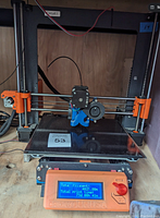 Front view of printer with carbon fiber build plate installed
