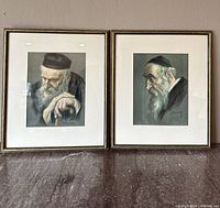 Pair of vintage framed rabbi portraits side by side