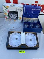 Overall view of the boxed salad bowl, boxed set of 4 glasses, and plates