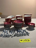 Overview of all sushi servingware pieces on table: dishes, bowls, plates, chopstick rests