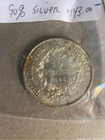 Obverse and reverse sides of French 10 Franc silver coin showing '10 FRANCS 1965' and inscription about silver content (90% silver).