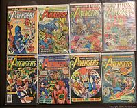 Front view of the 8 vintage Avengers comic books in protective sleeves showing classic Marvel cover art.