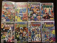 Front view of 8 Marvel Avengers comic books, each in individual plastic protective sleeves, showing colorful superhero cover art.