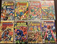 All 8 comic books arranged to show front covers including Avengers, Black Panther, Tiger-Man and Giant-Size Fantastic Four with bright comic cover art
