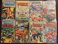Photo showing 8 comic books featuring DC and Marvel titles including Shazam, Prez, and Avengers.