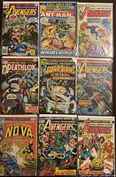 Photo showing a group of 9 Marvel comic books with visible titles and colorful covers including Avengers and Ant-Man.
