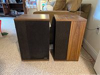 Front view of two Bose 501 Series IV speakers side by side