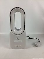 Front view of white bladeless fan with power cord and brand name Inmorsun visible on the base