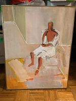 Full view of the vintage painting showing the seated figure in white drapery with abstract style and wooden frame.
