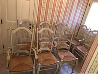 Eight chairs arranged in two rows showing all items