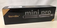 Box of new Terviix Mini Pro hair straightener showing product branding and image of the flat iron.