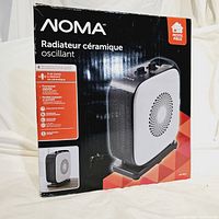 Box of Noma Radiateur céramique oscillant showing branding and product image